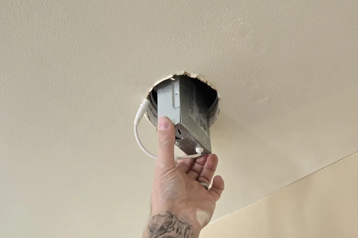 Mounting a device to a ceiling electrical box