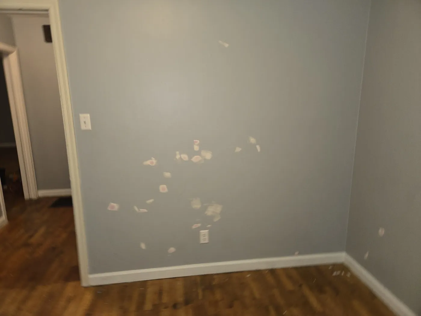Empty room with patched walls