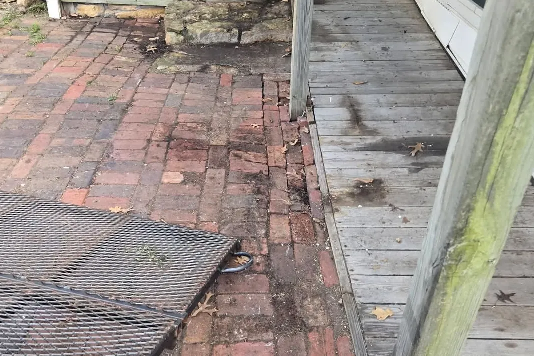 Brick patio and porch cleared after a clean-out
