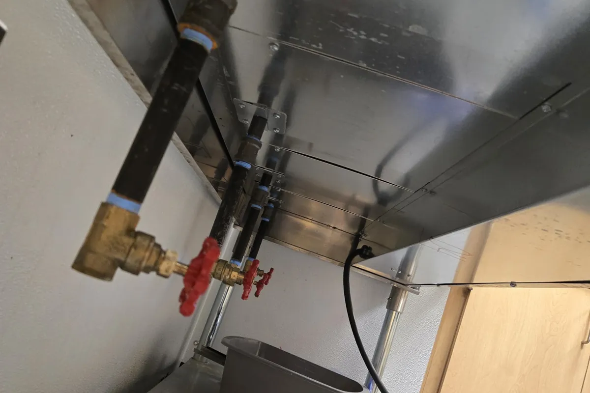 Utility sink supply valves and plumbing