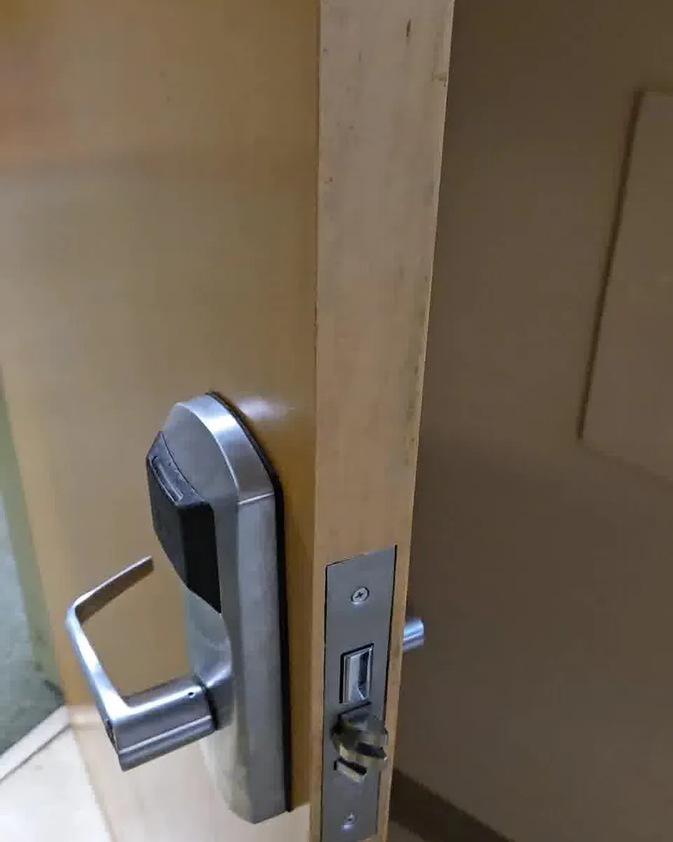 Commercial keycard lever lock installed on an office door