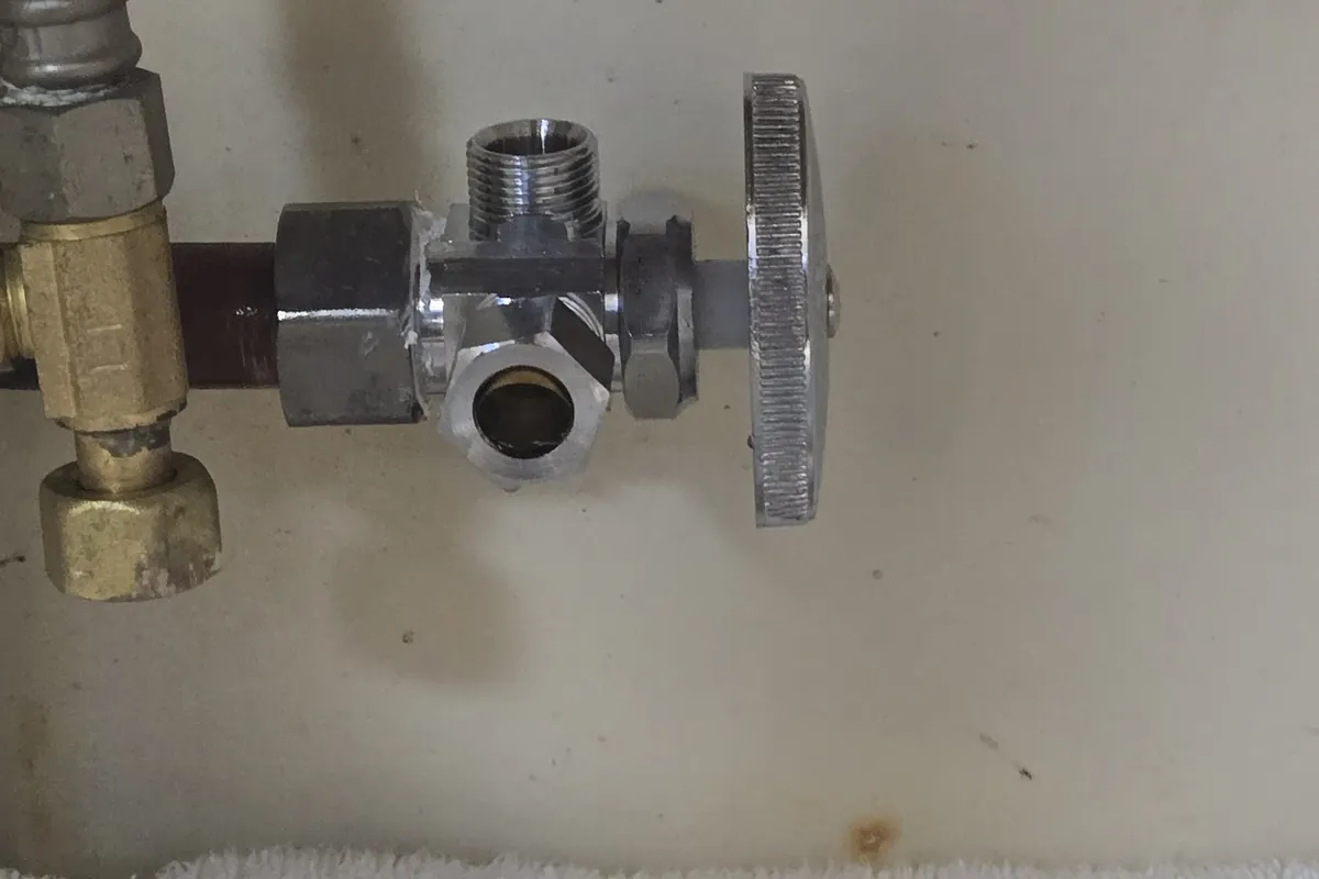 New quarter-turn angle stop valve installed under a sink