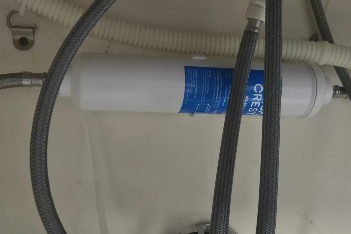 Braided supply lines and filter under a sink