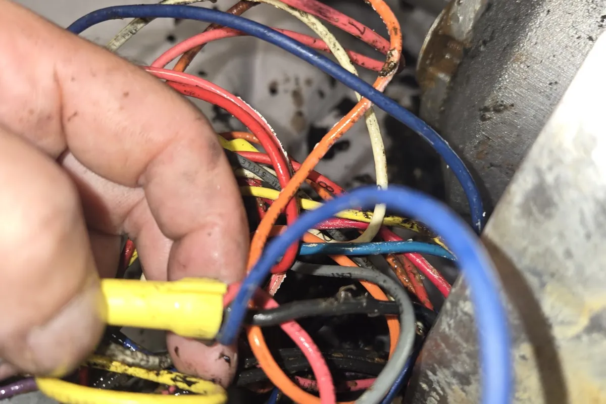 Reconnecting the wiring on a garbage disposal